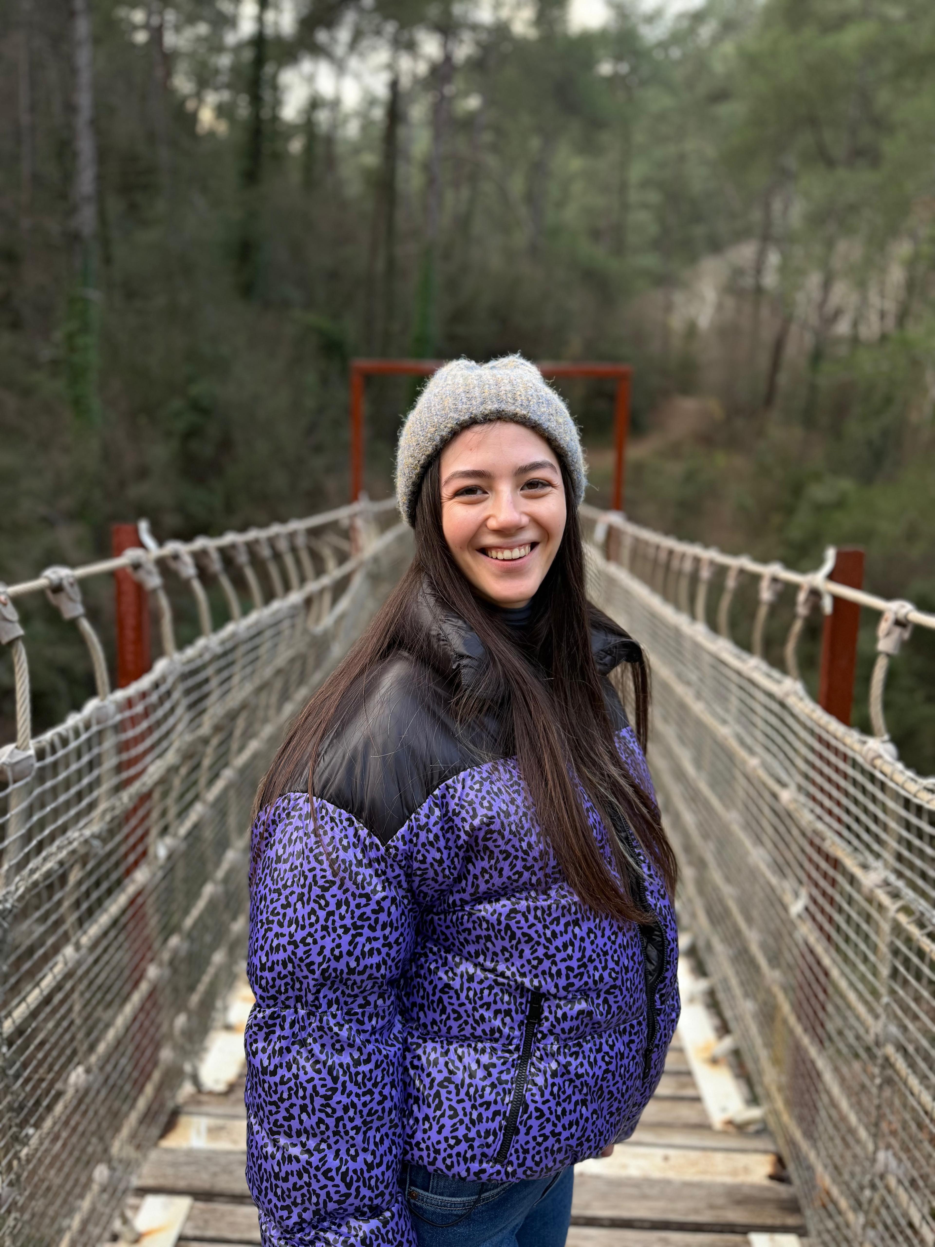 She crosses bridges and lights up forests